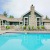 a swimming pool in front of a house