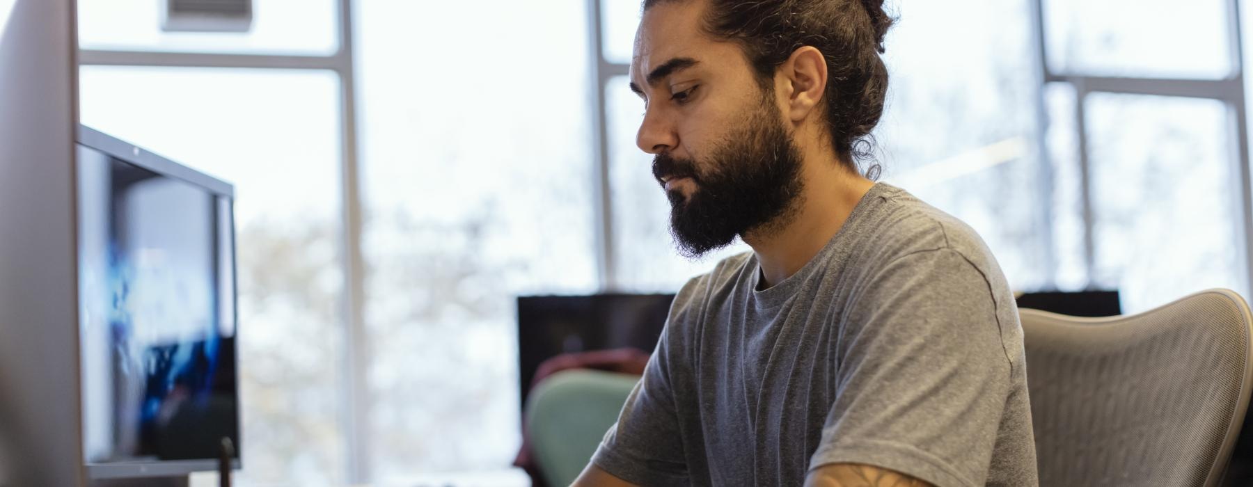 a man sitting at a desk