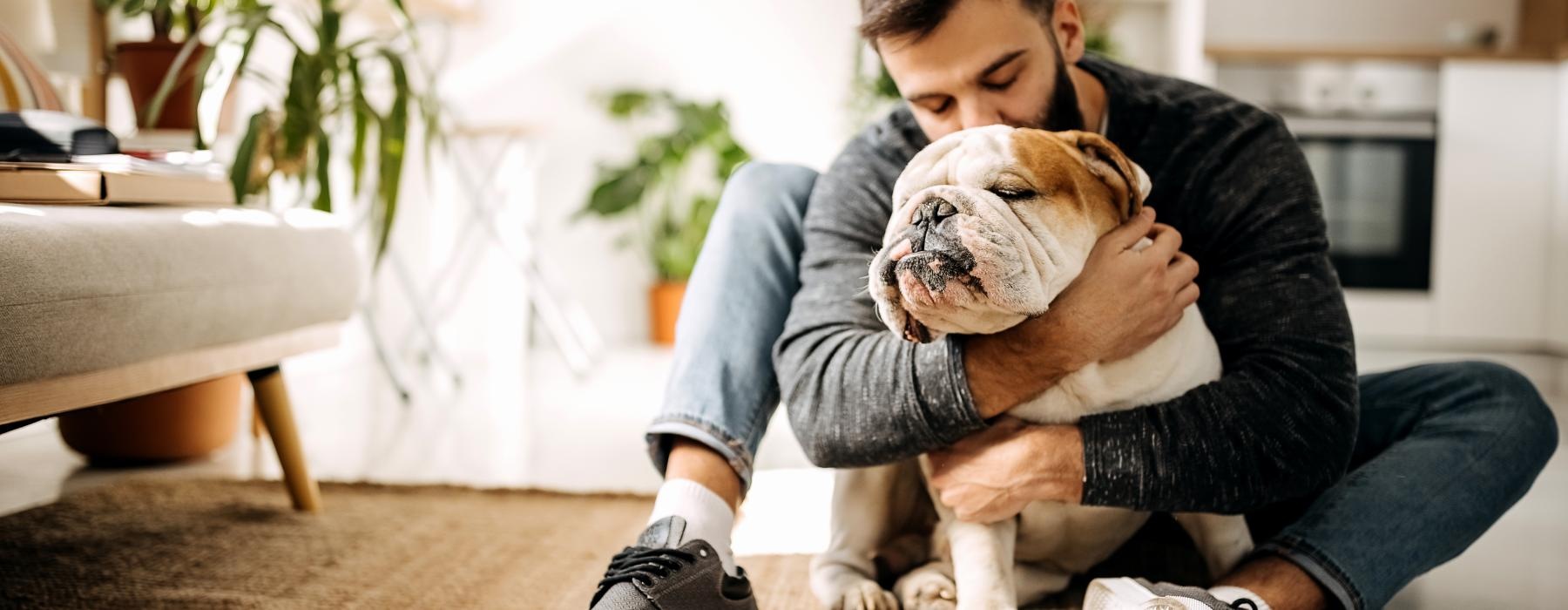 a person holding a dog