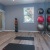 a room with a tv and bowling balls