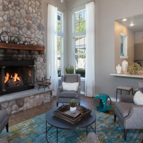 Enjoy our resident-only features a living room with a fireplace